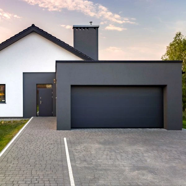 Modern home with sleek gray garage door after Tallahassee garage door repair service.