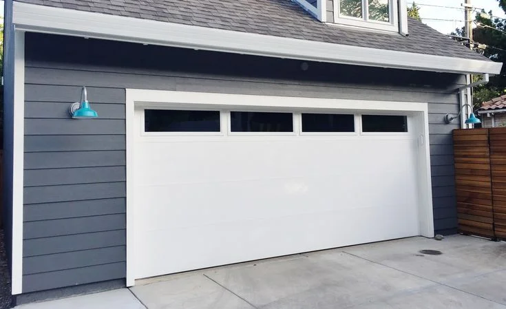 Well-kept garage door in Tallahassee showing results of regular maintenance service.